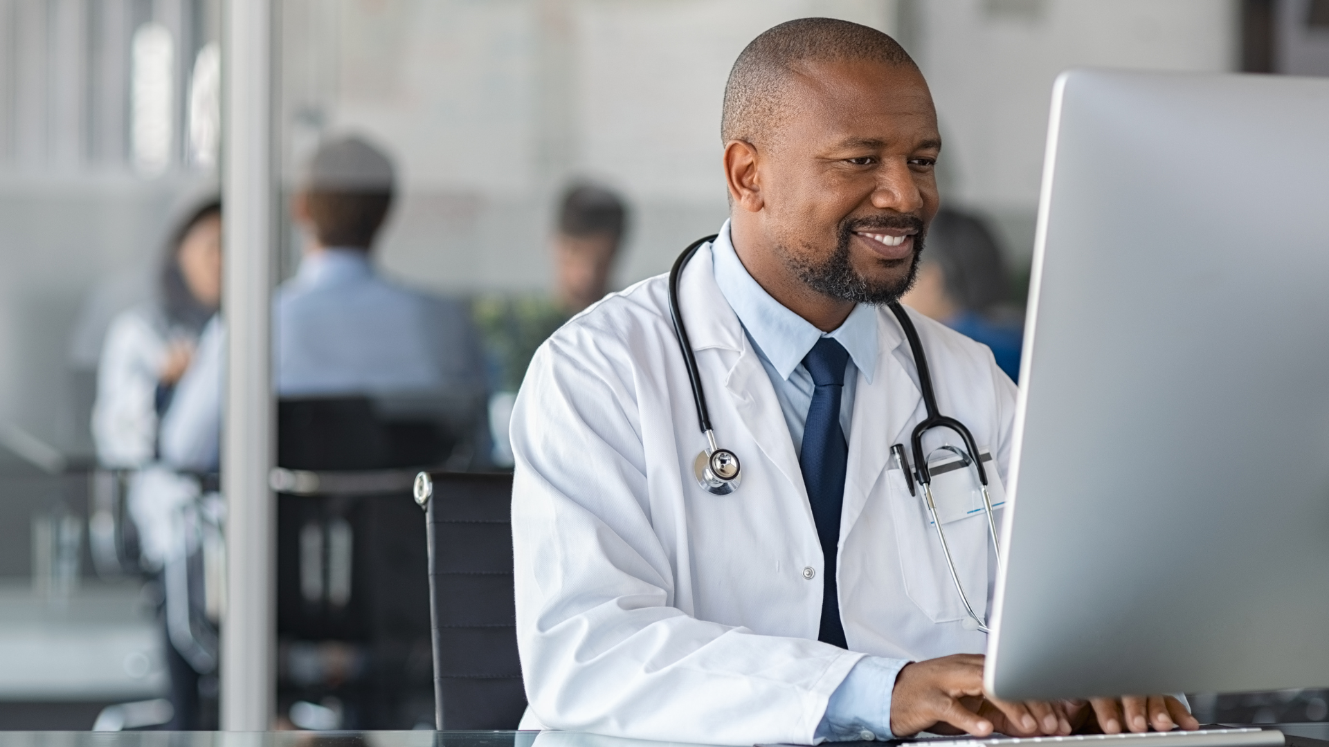 Stock Image - Doctor On Computer #2