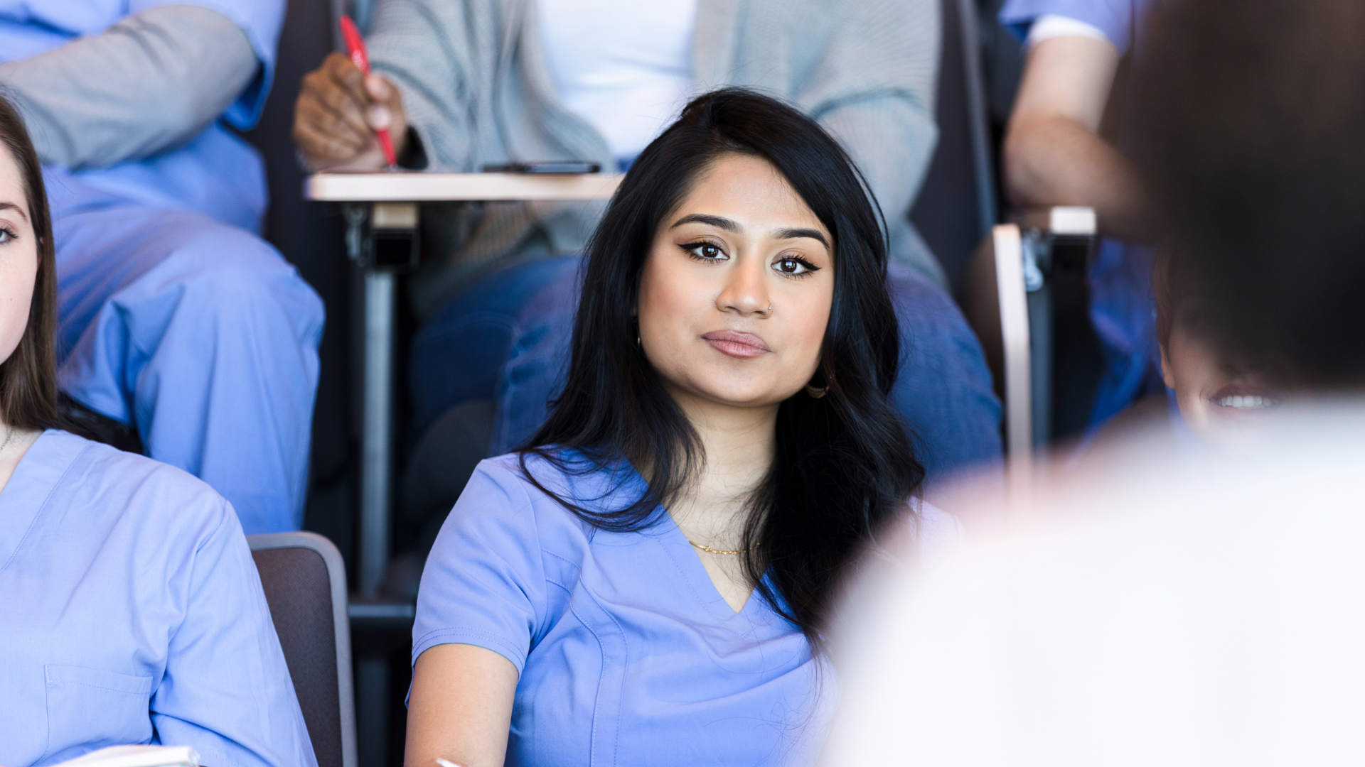 Stock Image - Student Listening in Class